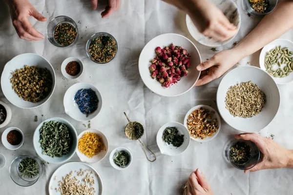 Hands sorting botanical ingredients