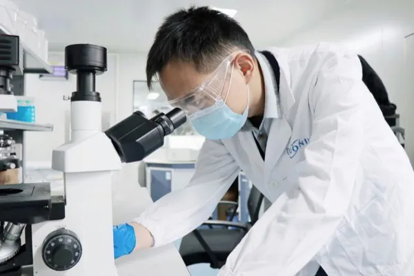 Researcher conducting analysis