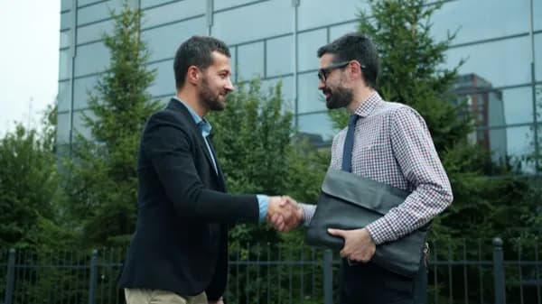 Business handshake — corporate partnership
